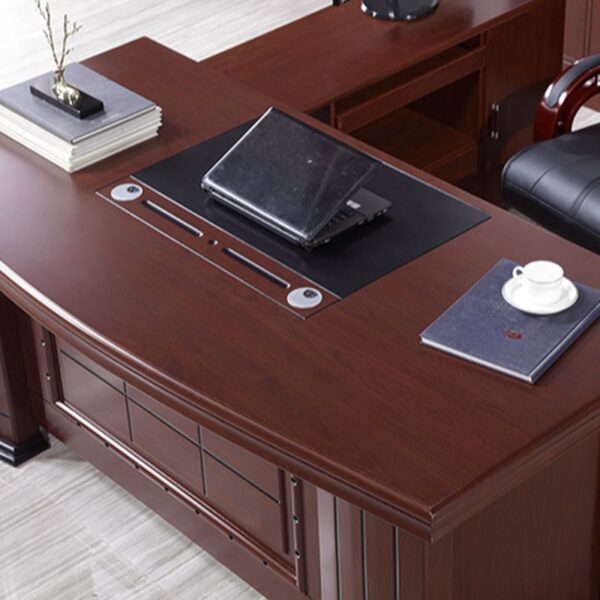 1.6-meter L-shaped office table in walnut finish with metal frame and cable management.