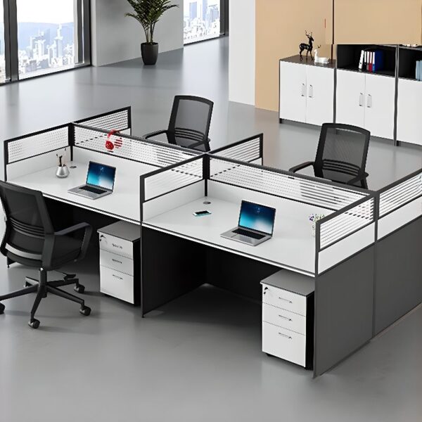 A modern 4-way modular office workstation featuring adjustable desks, integrated cable management, and privacy panels in a sleek office environment.