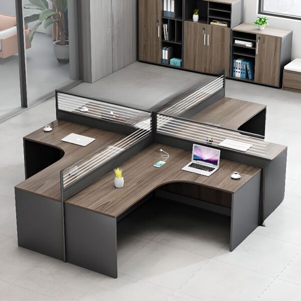 4-way curved office workstation with ergonomic design, four connected work areas, and integrated cable management in a modern office setting.