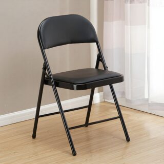 Black armless foldable leather chair against a minimalist backdrop, showcasing its sleek design and plush cushioning.