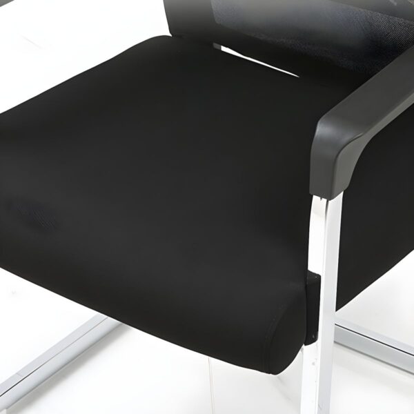 A modern cantilever guest chair with a sleek steel frame and upholstered seat, ideal for contemporary spaces.