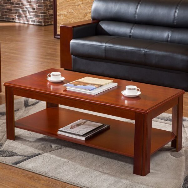 Sleek walnut wood Executive Coffee Table with minimalist design and integrated storage, set in a modern office environment.