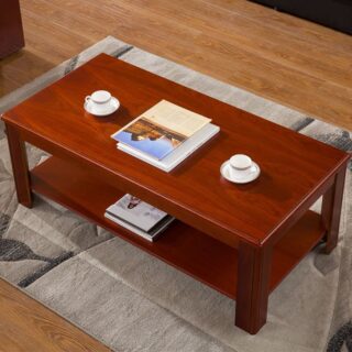 Sleek walnut wood Executive Coffee Table with minimalist design and integrated storage, set in a modern office environment.