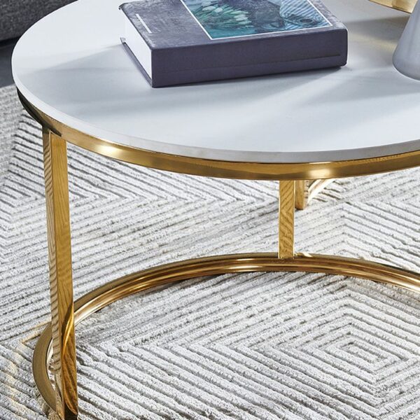 Marble Round Coffee Table with a polished marble top and a metal base in a stylish living room setting.