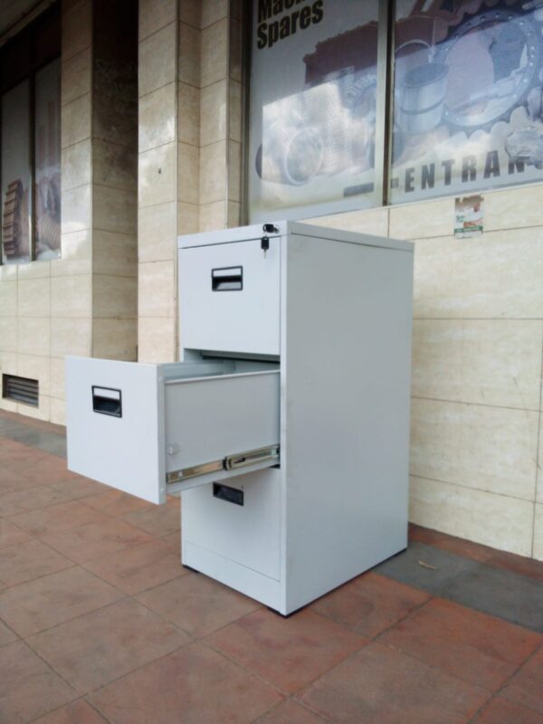 3-Drawers Steel Storage Cabinet in a modern office setting, showcasing its sleek design and spacious storage.