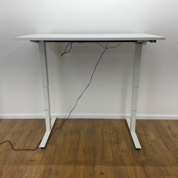 1.4 Meters Height Adjustable Standing Desk with a modern design, featuring an electric lift system and spacious tabletop in a stylish office setting.