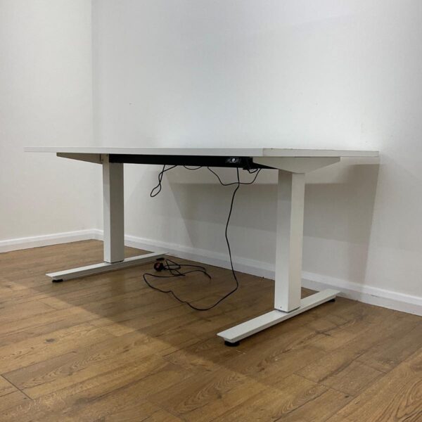 1.4 Meters Height Adjustable Standing Desk with a modern design, featuring an electric lift system and spacious tabletop in a stylish office setting.