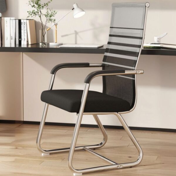 Upholstered high back office chair with modern design and ergonomic support in a stylish workspace.