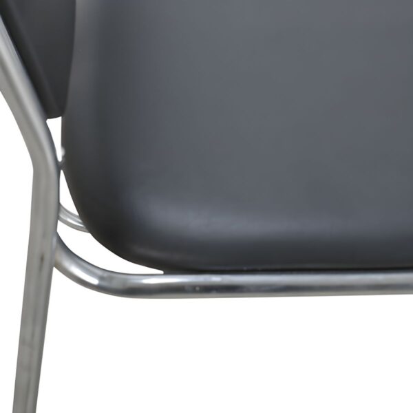 Stackable Chrome Office Guest Chair with padded seat and backrest in an office setting.