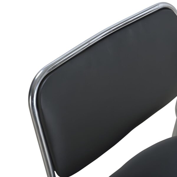 Stackable Chrome Office Guest Chair with padded seat and backrest in an office setting.