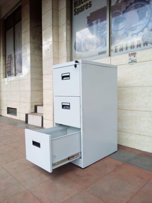 3-Drawers Steel Storage Cabinet in a modern office setting, showcasing its sleek design and spacious storage.