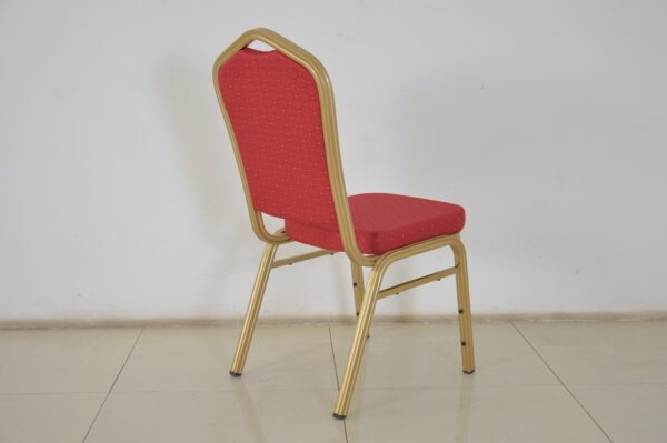 Red Banquet Conference Chair with plush padding and a sturdy frame, set in a stylish event space.