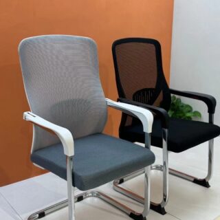 Ergonomic Mesh Back Arm Chair with breathable mesh backrest and adjustable height in a modern office setting.