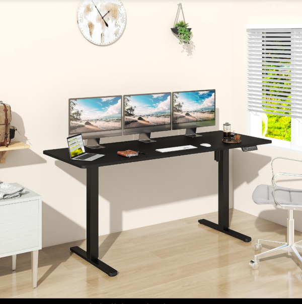 Adjustable height electric standing desk with a spacious tabletop and modern design, ideal for promoting better posture and productivity.