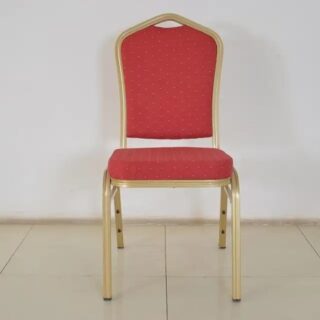 Red Banquet Conference Chair with plush padding and a sturdy frame, set in a stylish event space.