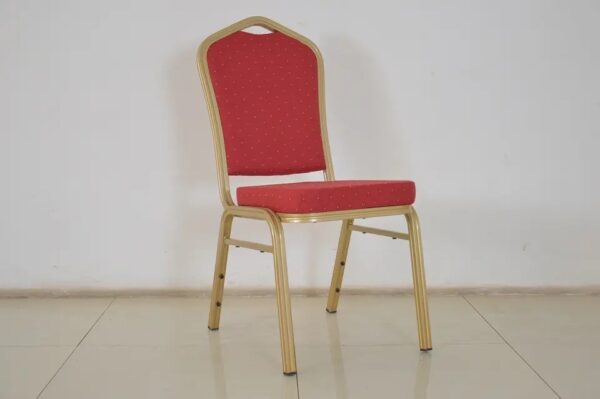 Red Banquet Conference Chair with plush padding and a sturdy frame, set in a stylish event space.