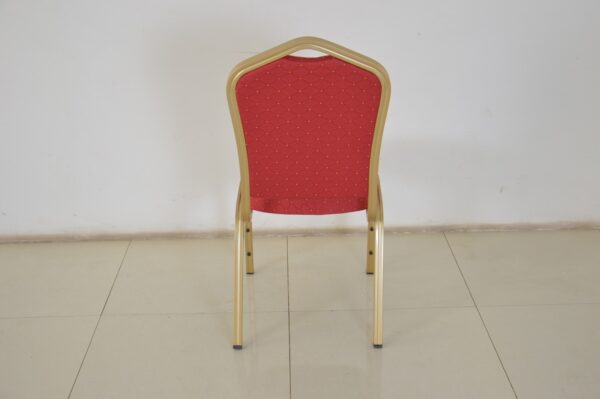 Red Banquet Conference Chair with plush padding and a sturdy frame, set in a stylish event space.