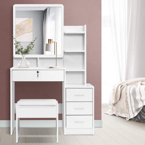 Elegant Vanity Bedroom Dressing Table with a mirror and drawers, styled in a modern bedroom setting.