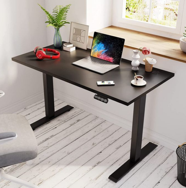 Adjustable height electric standing desk with a spacious tabletop and modern design, ideal for promoting better posture and productivity.