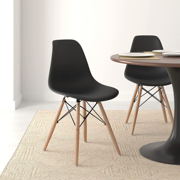 Eames Plastic Dining Seat with a sleek plastic shell and wooden legs, showcasing mid-century modern design.