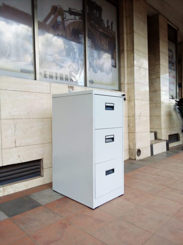 3-Drawers Steel Storage Cabinet in a modern office setting, showcasing its sleek design and spacious storage.