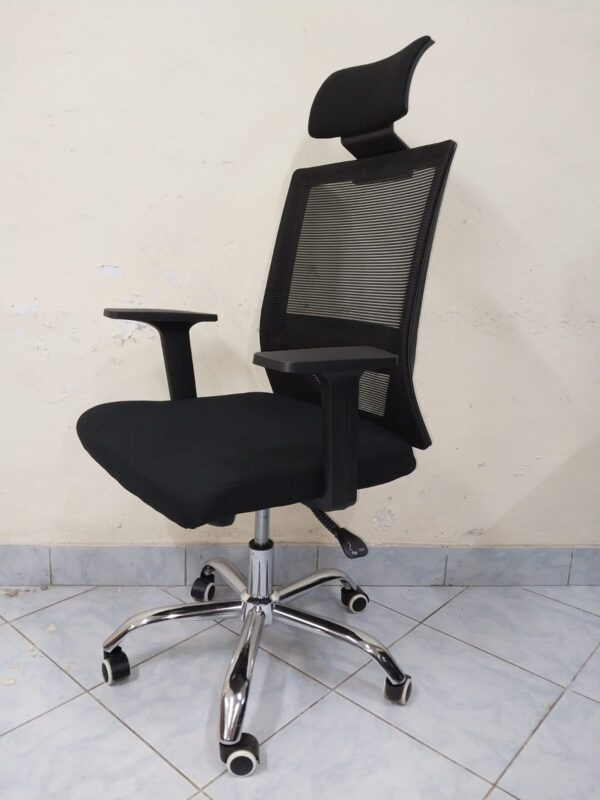 Black Orthopedic Office Seat with ergonomic design and breathable mesh back.