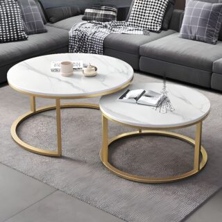 White Round Marble Table with polished surface and sturdy base in a modern living room setting.