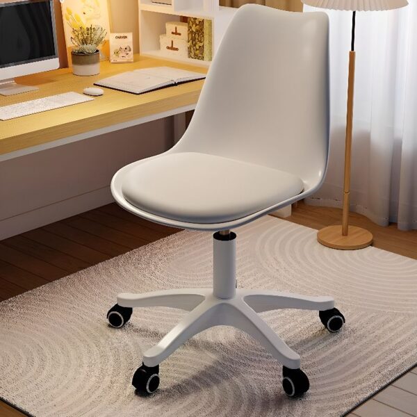 Swivel Eames Plastic White Chair with a sleek design and molded plastic seat, ideal for contemporary interiors.