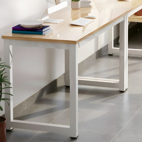 Wooden Top Brown Writing Desk with a spacious surface and tapered legs, showcasing natural wood grain.