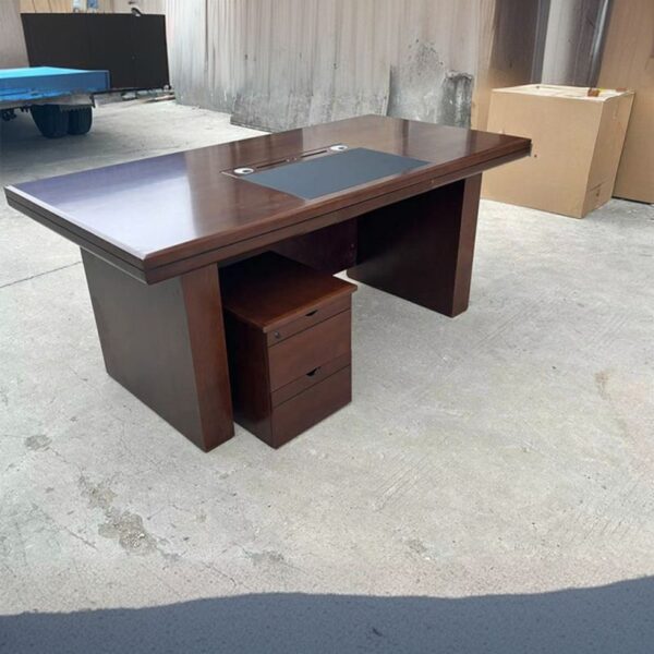 1400mm Mahogany Executive Office Table with drawers, featuring a rich finish and sleek design in a professional office setting.