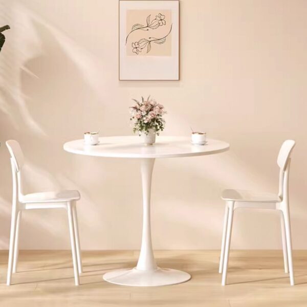 Simple Modern Round Dining Table with sleek finish and minimalist design, perfect for contemporary dining spaces.