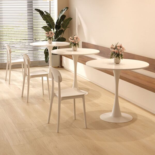 Simple Modern Round Dining Table with sleek finish and minimalist design, perfect for contemporary dining spaces.