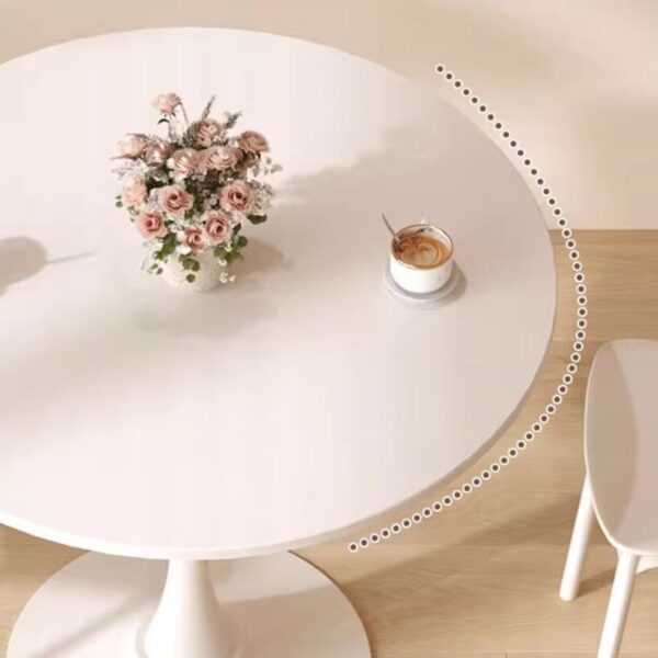 Simple Modern Round Dining Table with sleek finish and minimalist design, perfect for contemporary dining spaces.