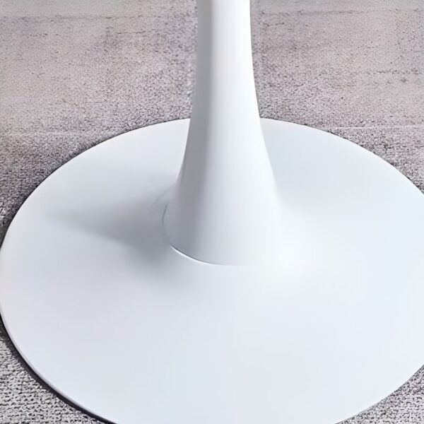 Modern White Round Dining Table with a sleek design and sturdy base in a contemporary dining room setting.