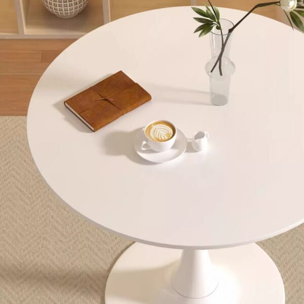 Modern Chalk White Round Dining Table with sleek minimalist design and sturdy base.