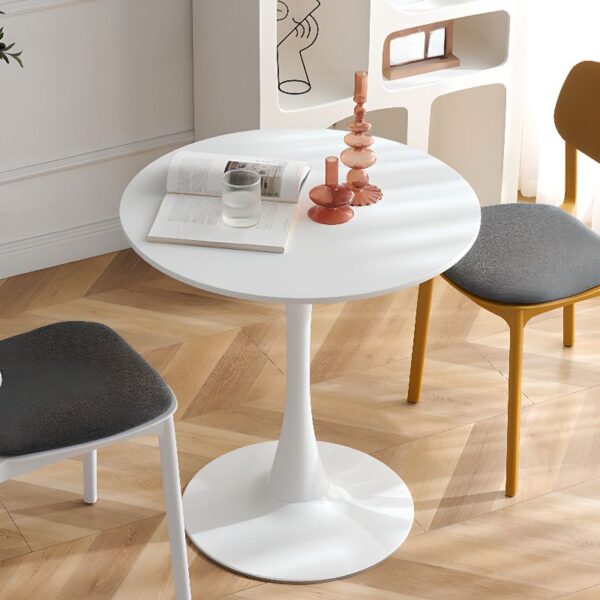 White Round Tulip Dining Table with a smooth marble top and iconic pedestal base, perfect for contemporary dining spaces.