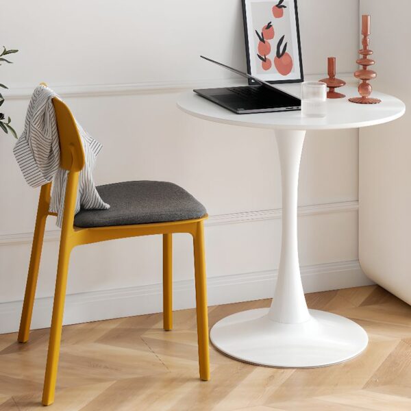 White Round Tulip Dining Table with a smooth marble top and iconic pedestal base, perfect for contemporary dining spaces.