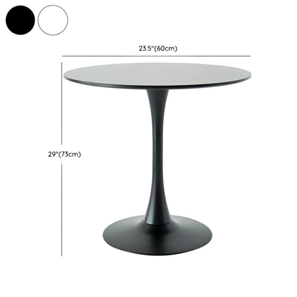 Black Round Wooden Tulip Dining Table with a sleek circular wood top and minimalist pedestal base in a modern dining room setting.