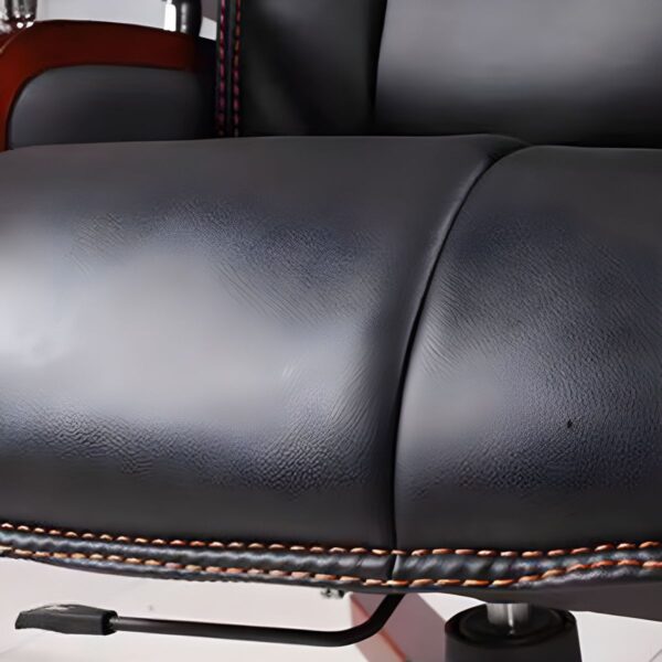 Executive Director’s Reclining Office Seat with high backrest, padded armrests, and ergonomic design.