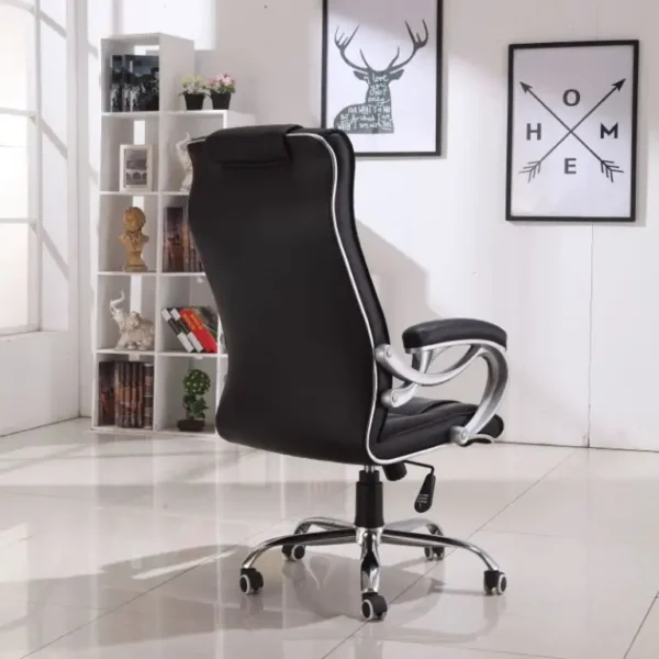 High-back Leather Executive Office Chair with premium leather upholstery, adjustable armrests, and ergonomic design, set in an office environment.