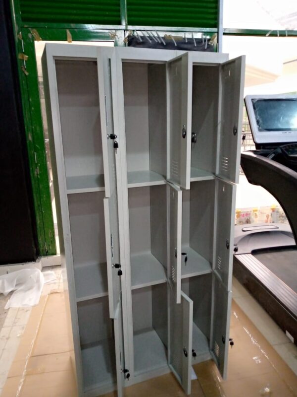 9-Locker Steel Storage Office Cabinet with individual lockable compartments in a modern office or workspace setting.