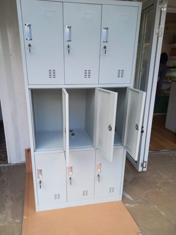 9-Locker Steel Storage Office Cabinet with individual lockable compartments in a modern office or workspace setting.