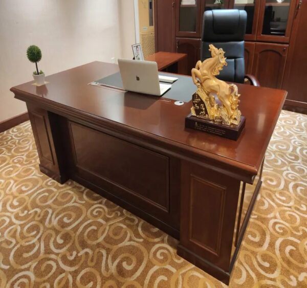 A 1600mm Executive Directors Study Office Desk, featuring a spacious work surface, built-in drawers, and a sleek, professional design.