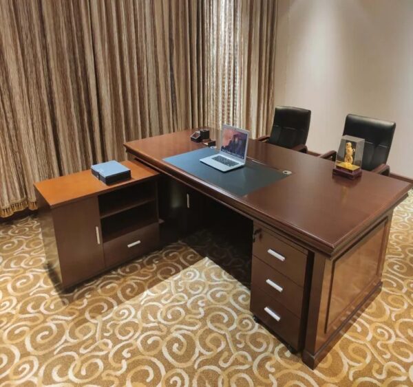 A 1600mm Executive Directors Study Office Desk, featuring a spacious work surface, built-in drawers, and a sleek, professional design.