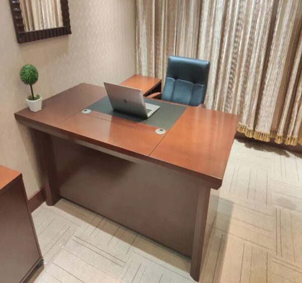 A 1600mm Executive Directors Study Office Desk, featuring a spacious work surface, built-in drawers, and a sleek, professional design.