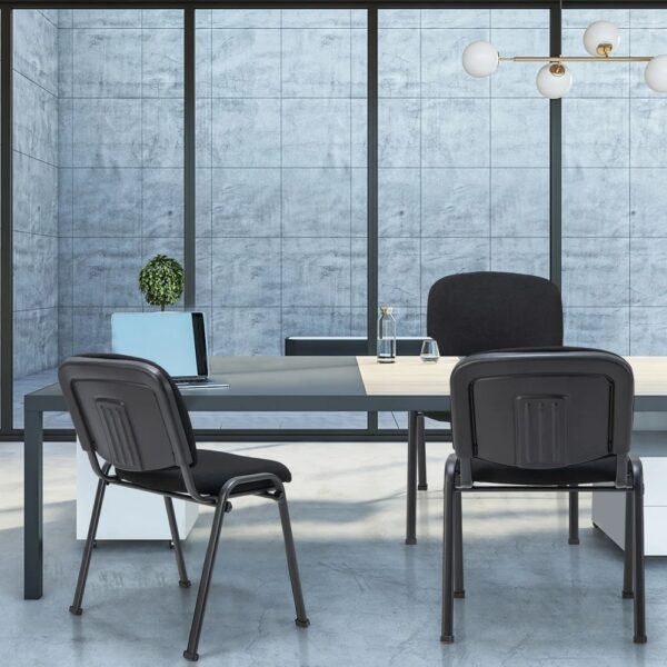 Tosca Conference/Visitors Office Chair with ergonomic design, chrome base, and padded upholstery in an office setting.