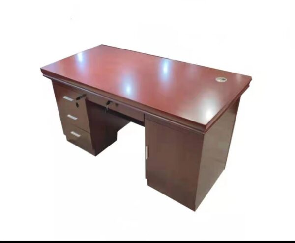 A 1400mm Solid Wood Executive Office Table with a polished finish, offering a spacious and elegant workspace for professional offices.