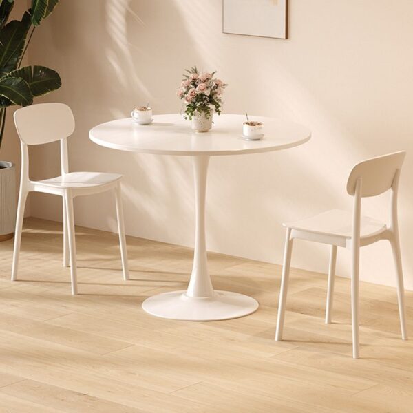 Simple Modern Round Dining Table with sleek finish and minimalist design, perfect for contemporary dining spaces.