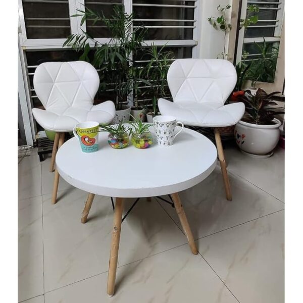 Faux Leather White Eames Dining Chair with ergonomic seat and wooden cross-frame base.