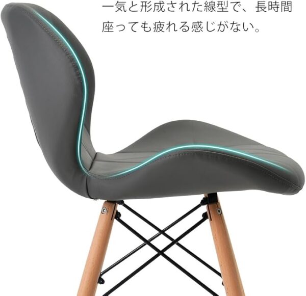 Nordic Eames Modern Dining Chair featuring a curved molded plastic seat with natural wood legs.